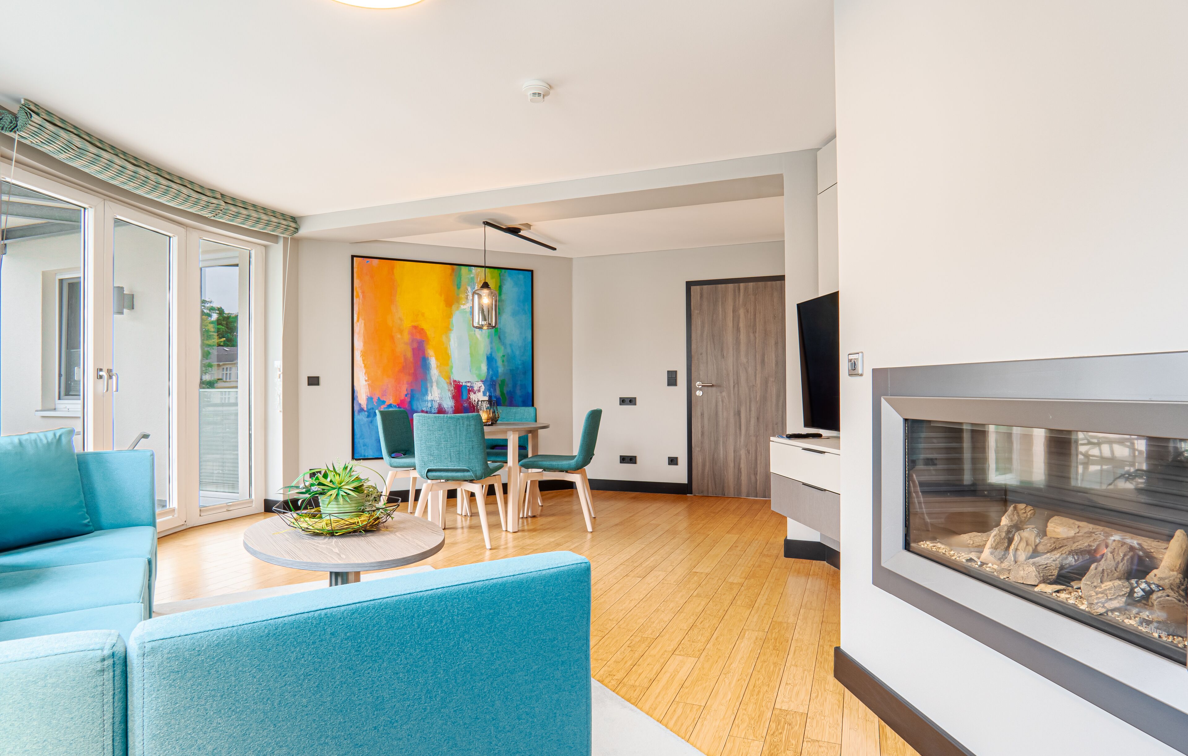 two-bedroom apartment - land side | living area | 40-inch flat-screen tv with satellite channels, tv, fireplace