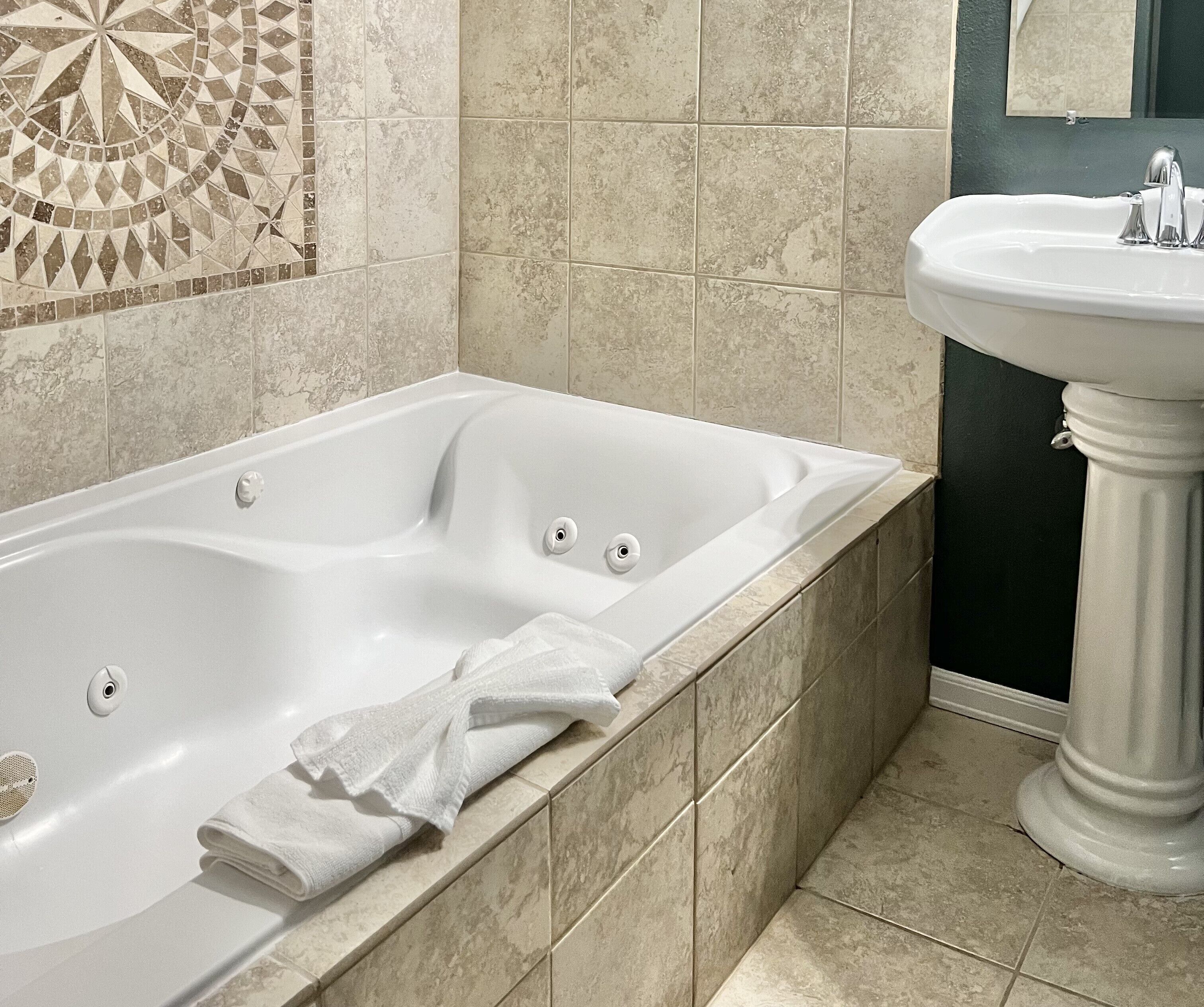 room | bathroom | hair dryer, bathrobes, towels, shampoo