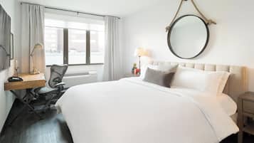 Luxe beddengoed, een kluis op de kamer, een strijkplank/strijkijzer