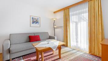 Estúdio luxo | Área de estar | TV