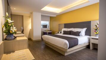 Habitación ejecutiva | Ropa de cama de alta calidad, caja fuerte, wifi gratis y ropa de cama