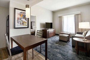 Premium bedding, down comforters, pillowtop beds, in-room safe