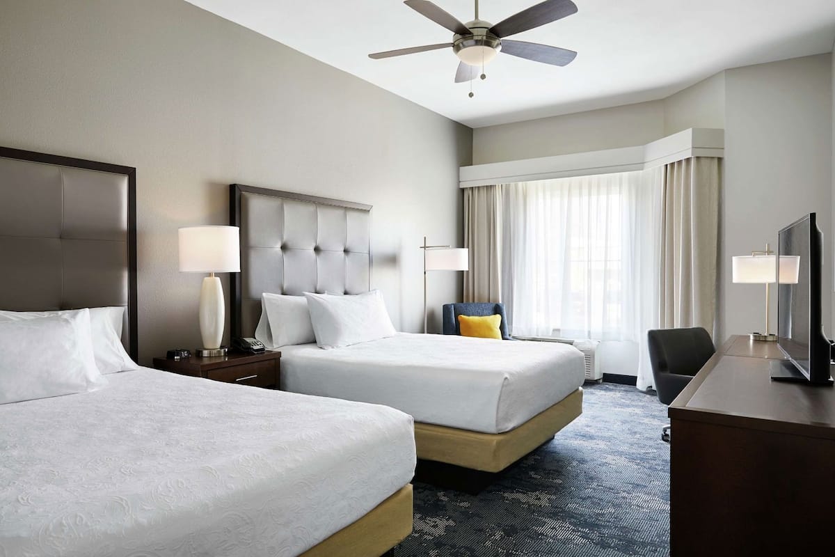Premium bedding, down comforters, pillowtop beds, in-room safe