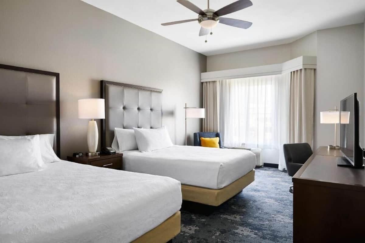 Premium bedding, down comforters, pillowtop beds, in-room safe