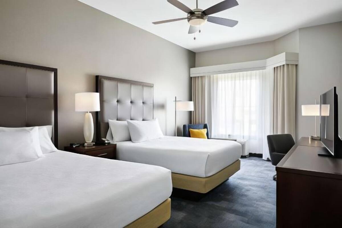 Premium bedding, down duvets, pillow-top beds, in-room safe