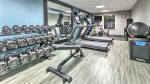 A gym with treadmills, dumbbells, and a stationary bike. - Hampton Inn Kingsville (Kingsville)