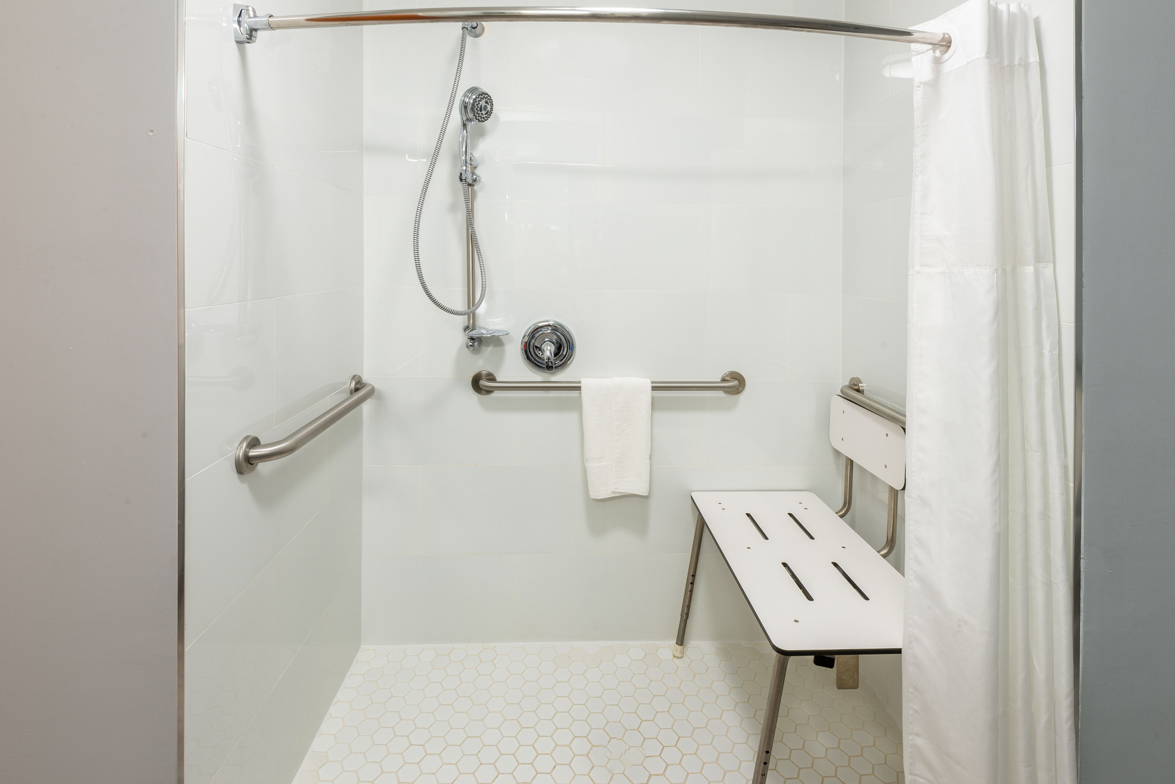 room, 1 king bed, accessible (mobility & hearing, roll-in shower) | bathroom | free toiletries, hair dryer, towels