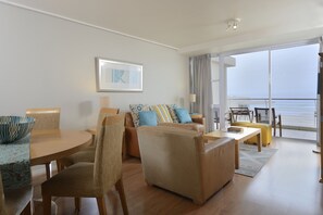 Deluxe Apartment | Living area | TV - Sunstays Lagoon Beach (Cape Town)