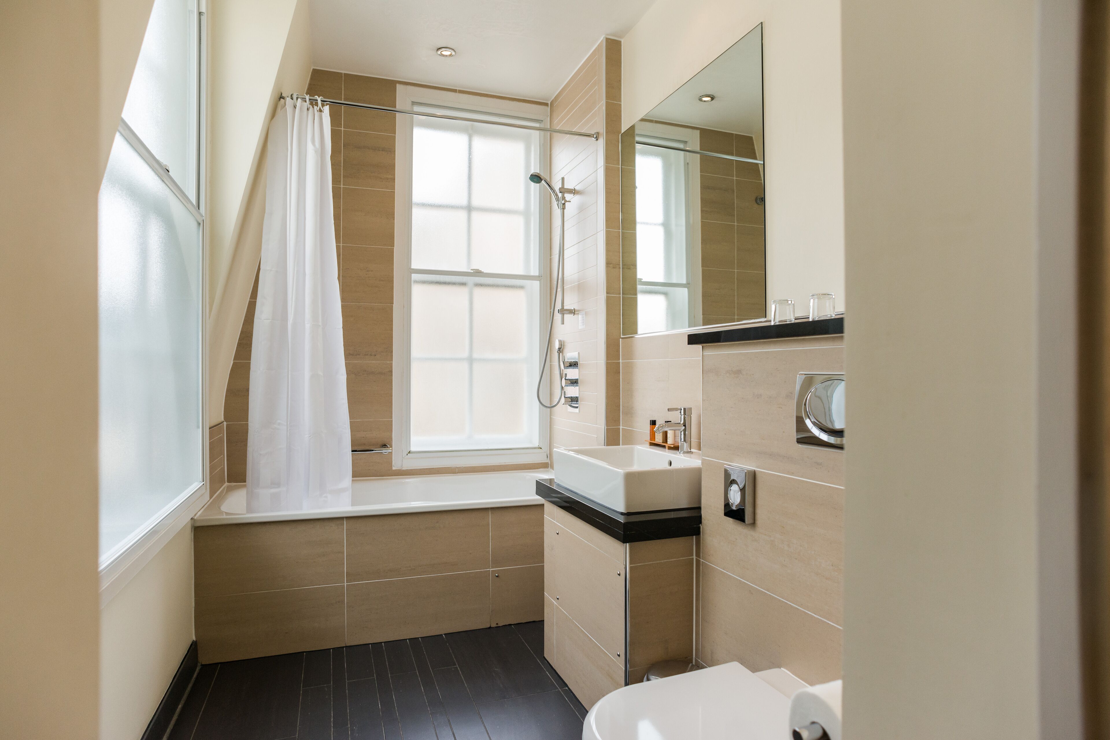 eco-friendly toiletries, hair dryer, towels, soap