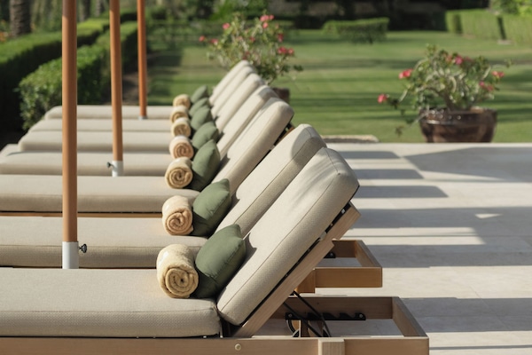 Outdoor pool, pool umbrellas, sun loungers