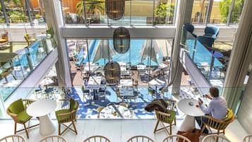 Breakfast, lunch, dinner served; Mediterranean cuisine, pool views