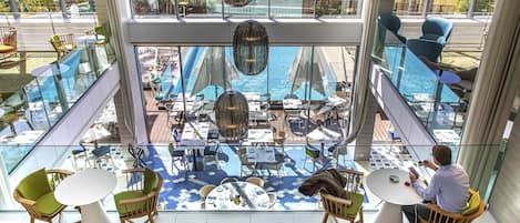 Breakfast, lunch, dinner served; Mediterranean cuisine, pool views