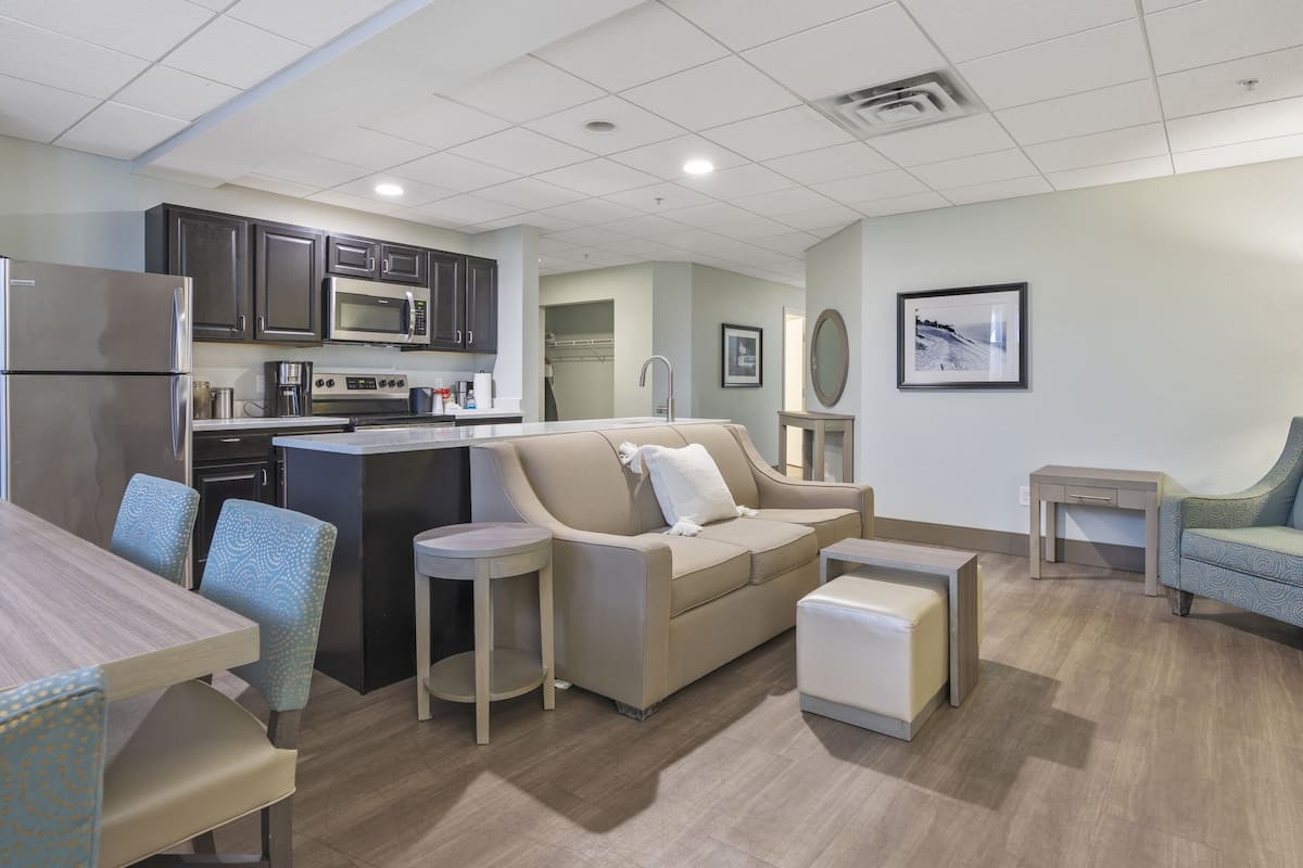Cherry Tree Family Suite | Living area | 45-inch LCD TV with cable channels, TV, streaming services