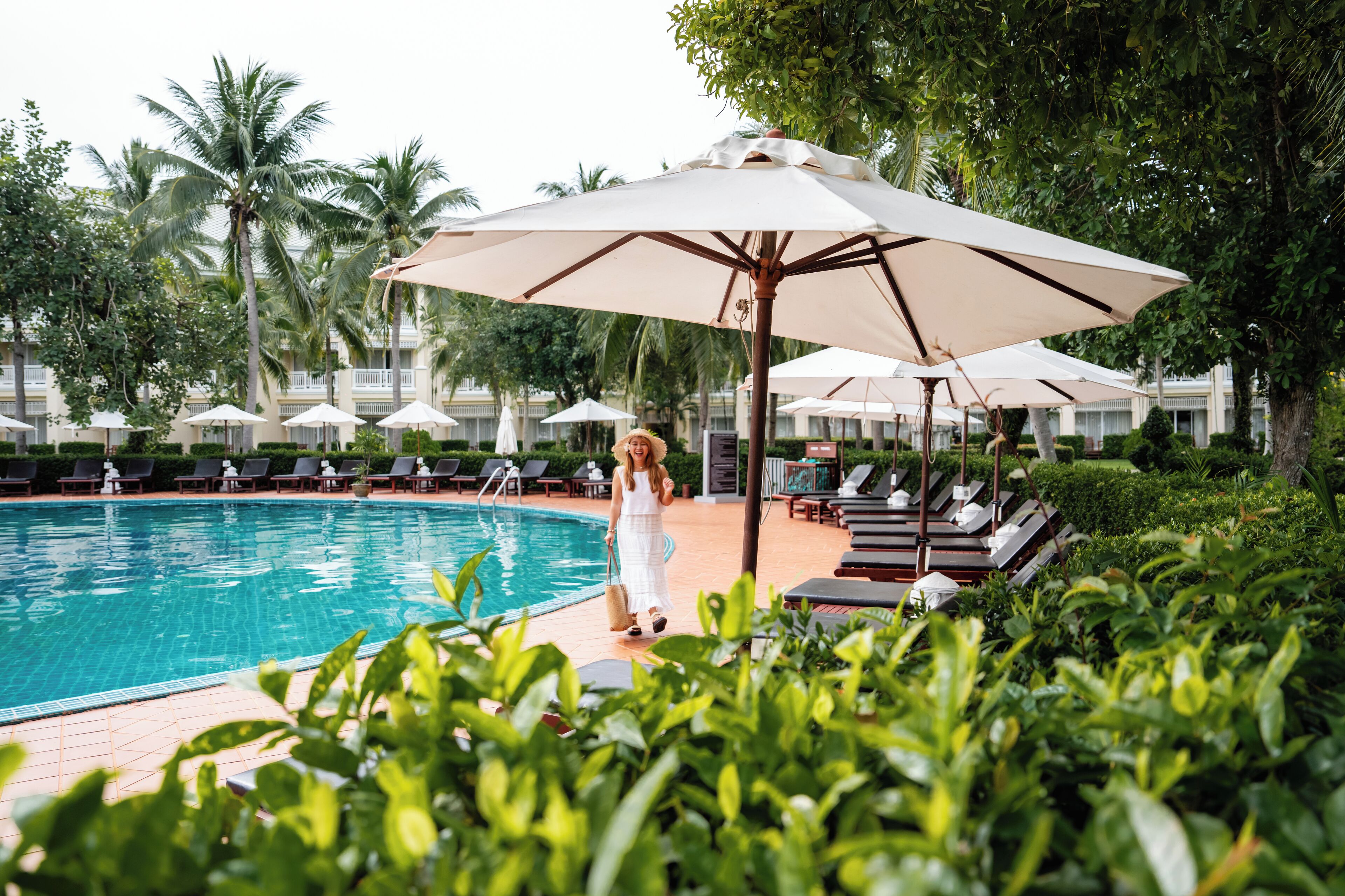 outdoor pool, pool umbrellas, pool loungers