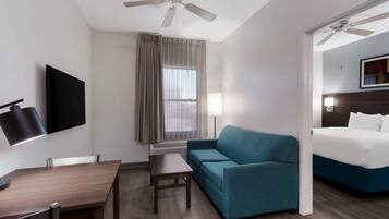 Suite, 1 King Bed with Sofa bed, Non Smoking | Pillowtop beds, desk, blackout drapes, iron/ironing board