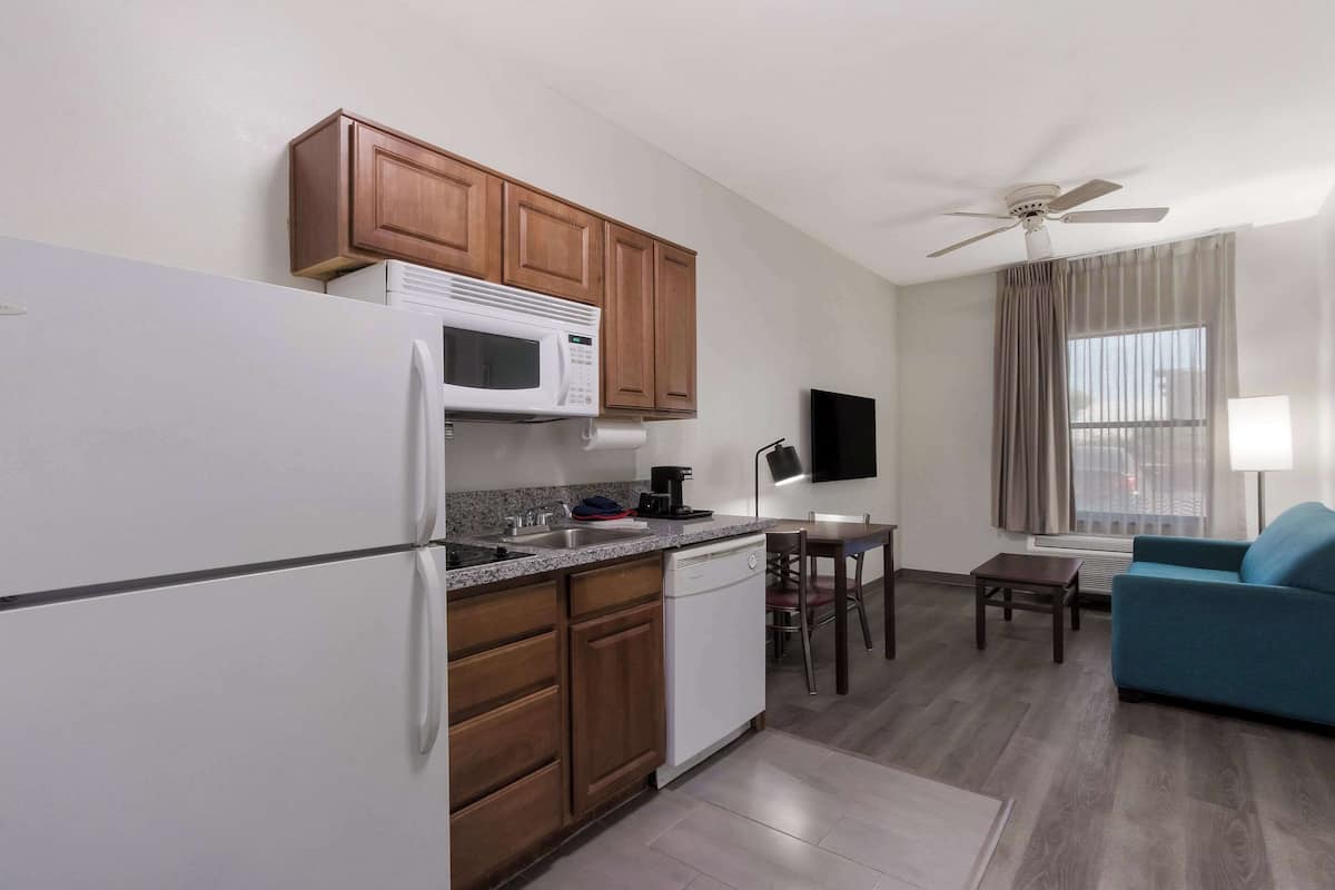 Pillow-top beds, desk, blackout curtains, iron/ironing board