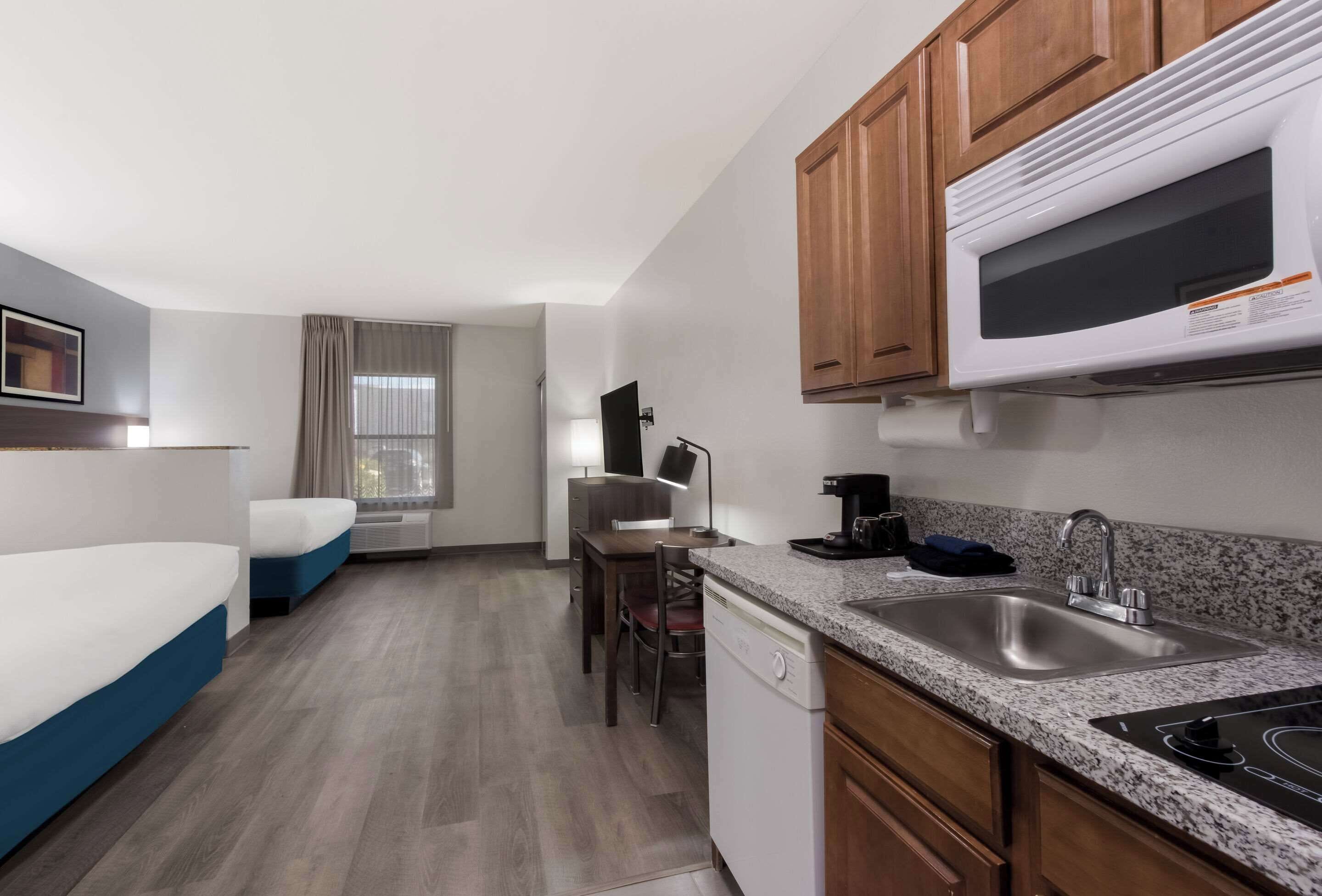 Suite, Multiple Beds, Non Smoking | Pillow-top beds, desk, blackout curtains, iron/ironing board