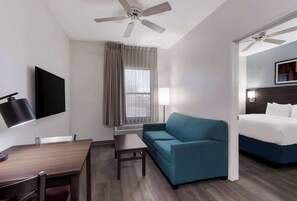 Pillow-top beds, desk, blackout curtains, iron/ironing board