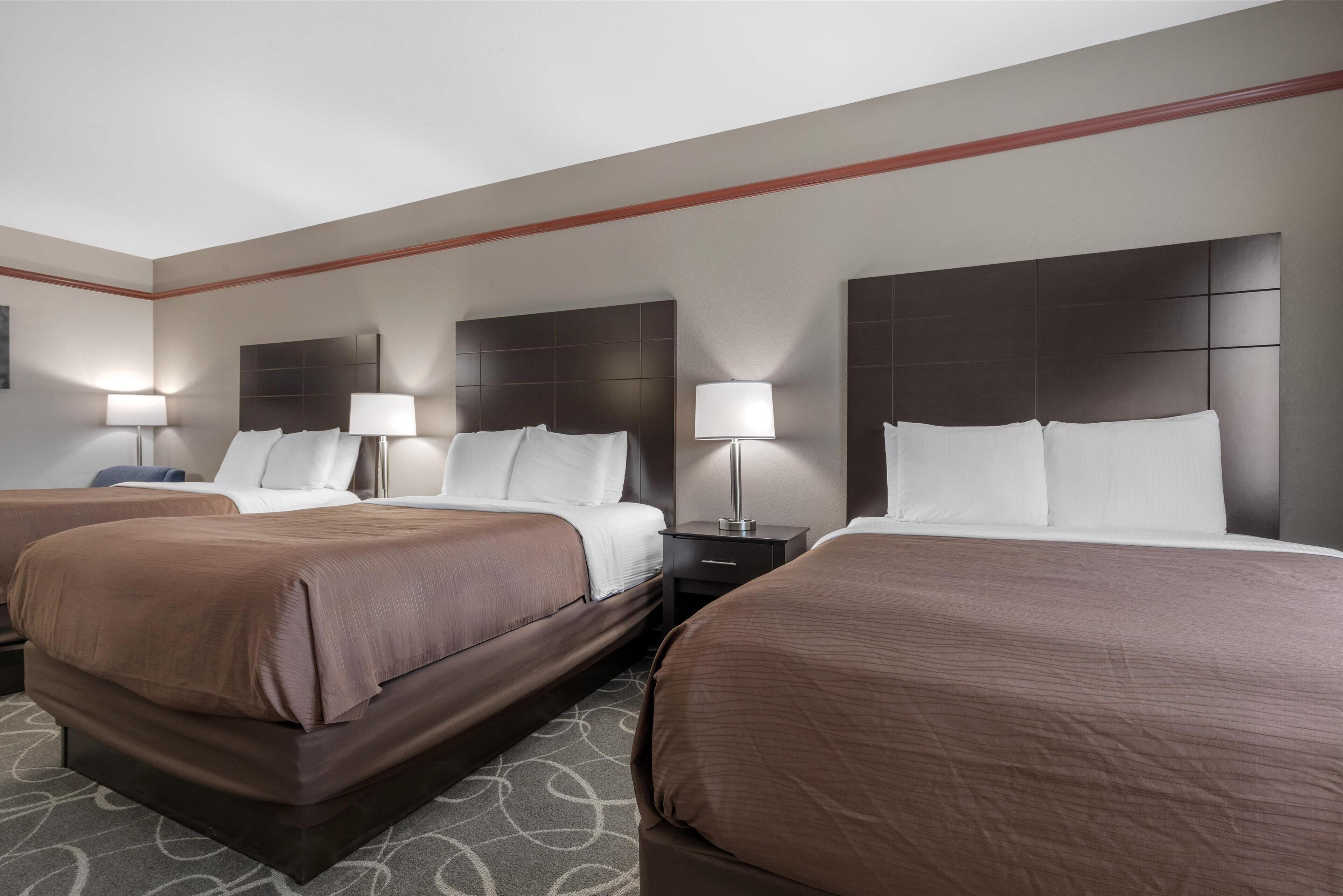 standard room, multiple beds, non smoking, refrigerator & microwave | pillow-top beds, desk, laptop workspace, iron/ironing board