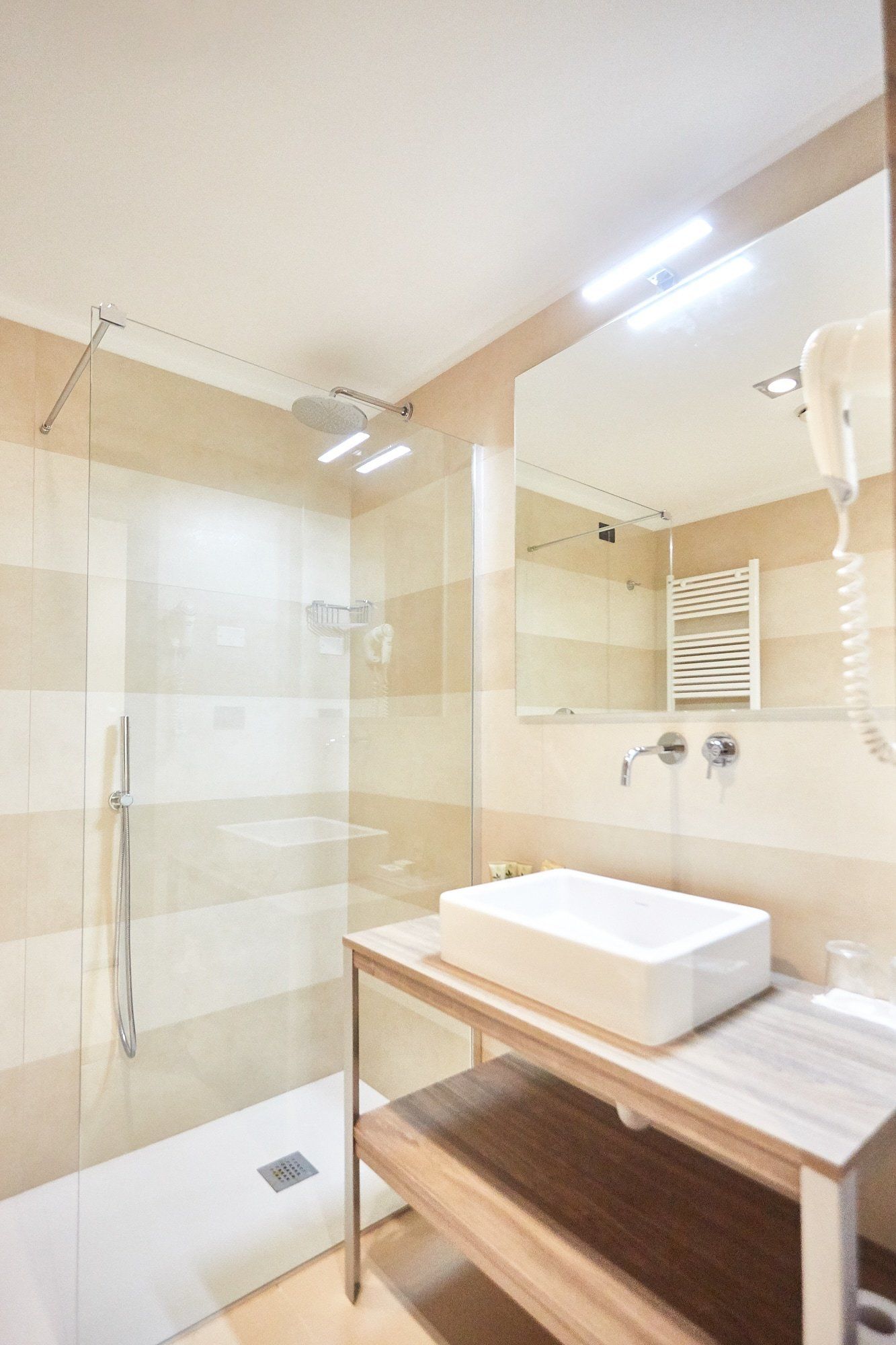 rainfall showerhead, free toiletries, hair dryer, slippers