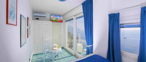 Junior Suite, Balcony, Sea View | Hypo-allergenic bedding, minibar, in-room safe, desk
