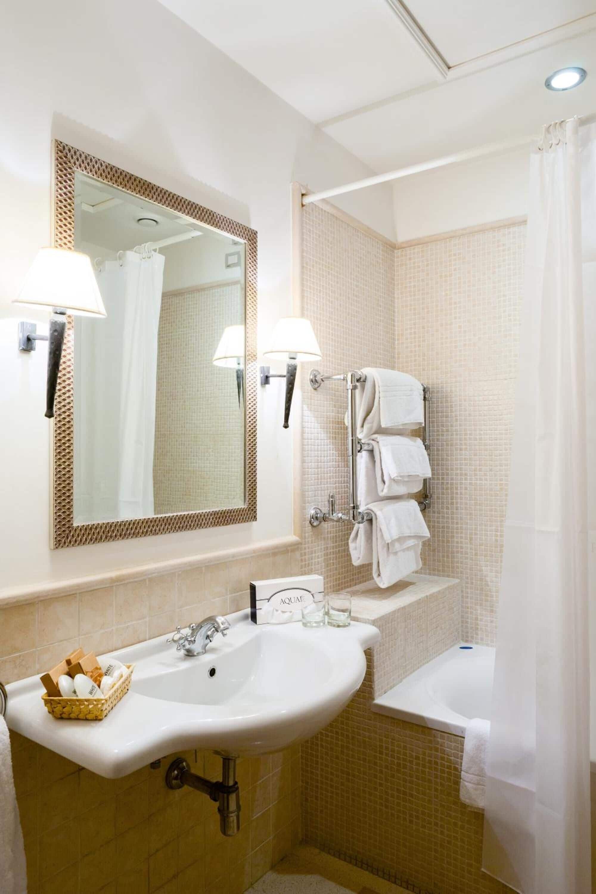 free toiletries, hair dryer, bidet, towels