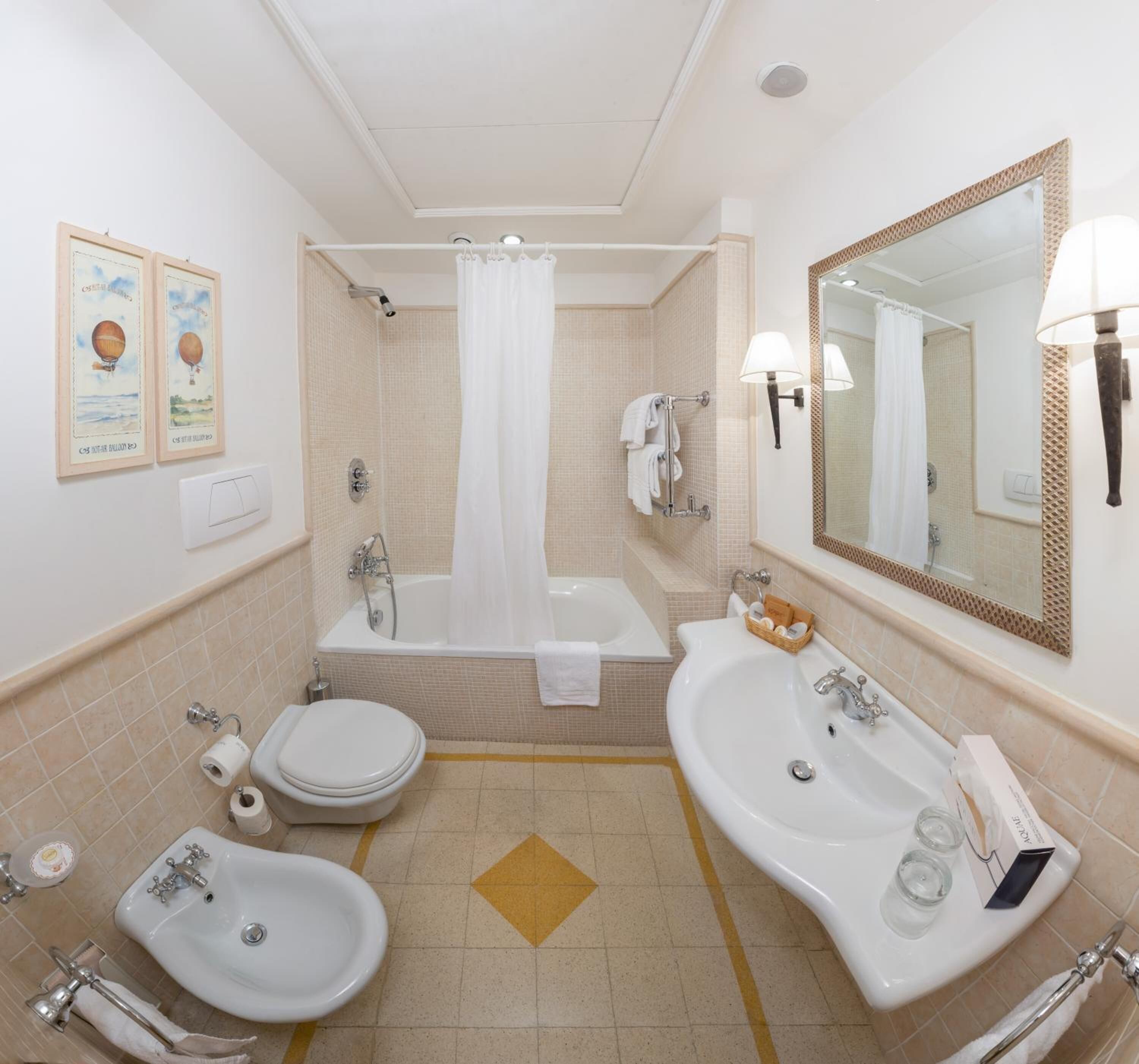 free toiletries, hair dryer, bidet, towels