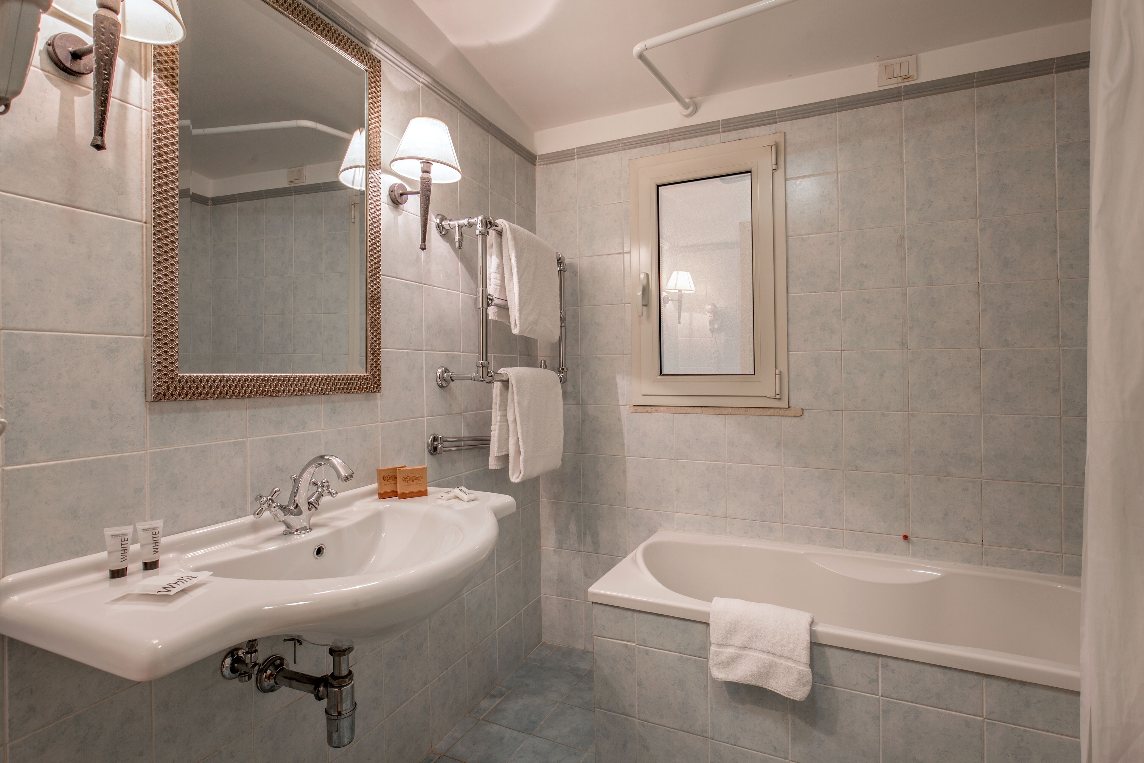 free toiletries, hair dryer, bidet, towels