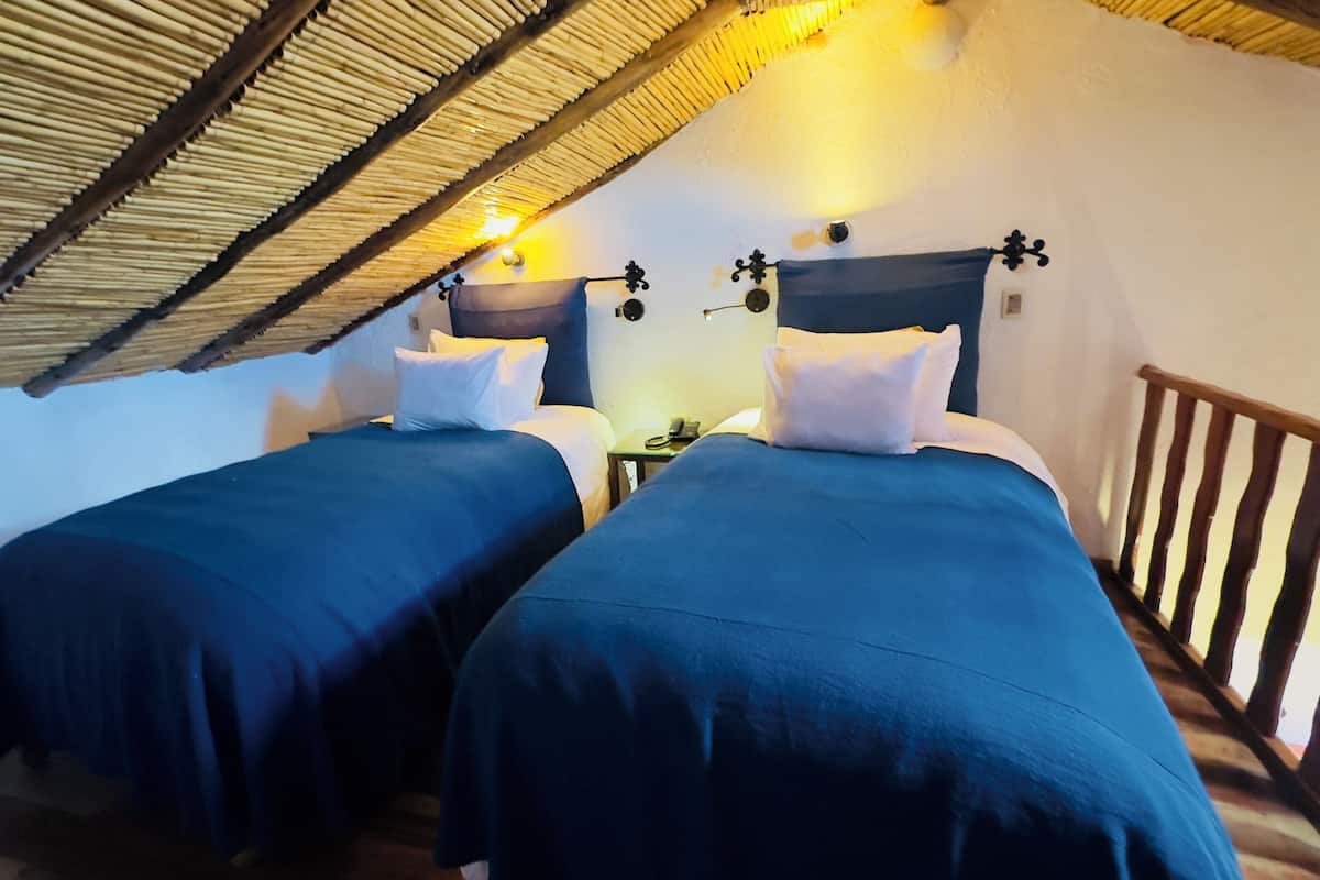 1 dormitorio, ropa de cama de alta calidad, edredones de plumas