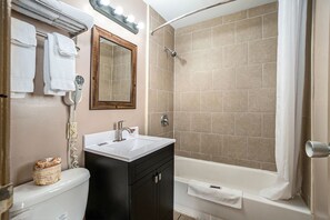 Basic Room | Bathroom | Combined shower/tub, hair dryer, towels, soap - Great Lakes Inn and Suites (South Haven)