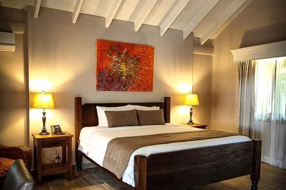 double room, river view (riverside) | premium bedding, in-room safe, individually decorated