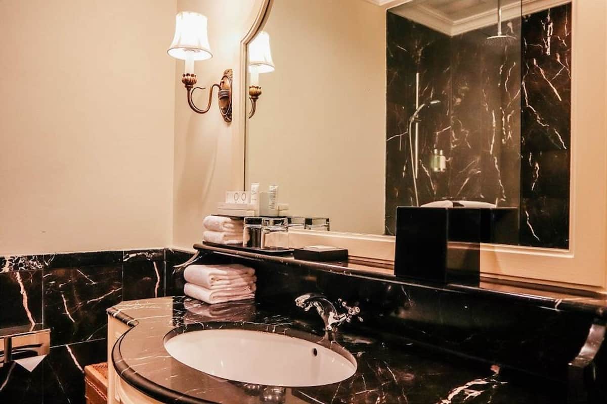 shower, hair dryer, bathrobes, slippers