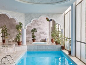 Indoor pool, seasonal outdoor pool, pool umbrellas, pool loungers