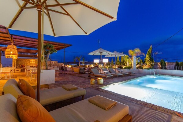 Outdoor pool, pool umbrellas, pool loungers