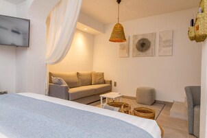 Deluxe Double Room, Ground Floor | Pillowtop beds, minibar, in-room safe, individually furnished