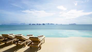 15 outdoor pools, open 9:00 AM to 5:00 PM, pool umbrellas, sun loungers