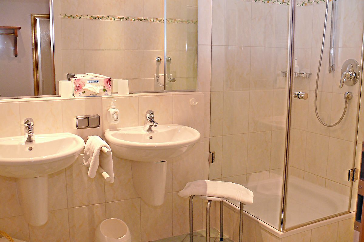 deep-soaking bathtub, free toiletries, hair dryer, dressing gowns