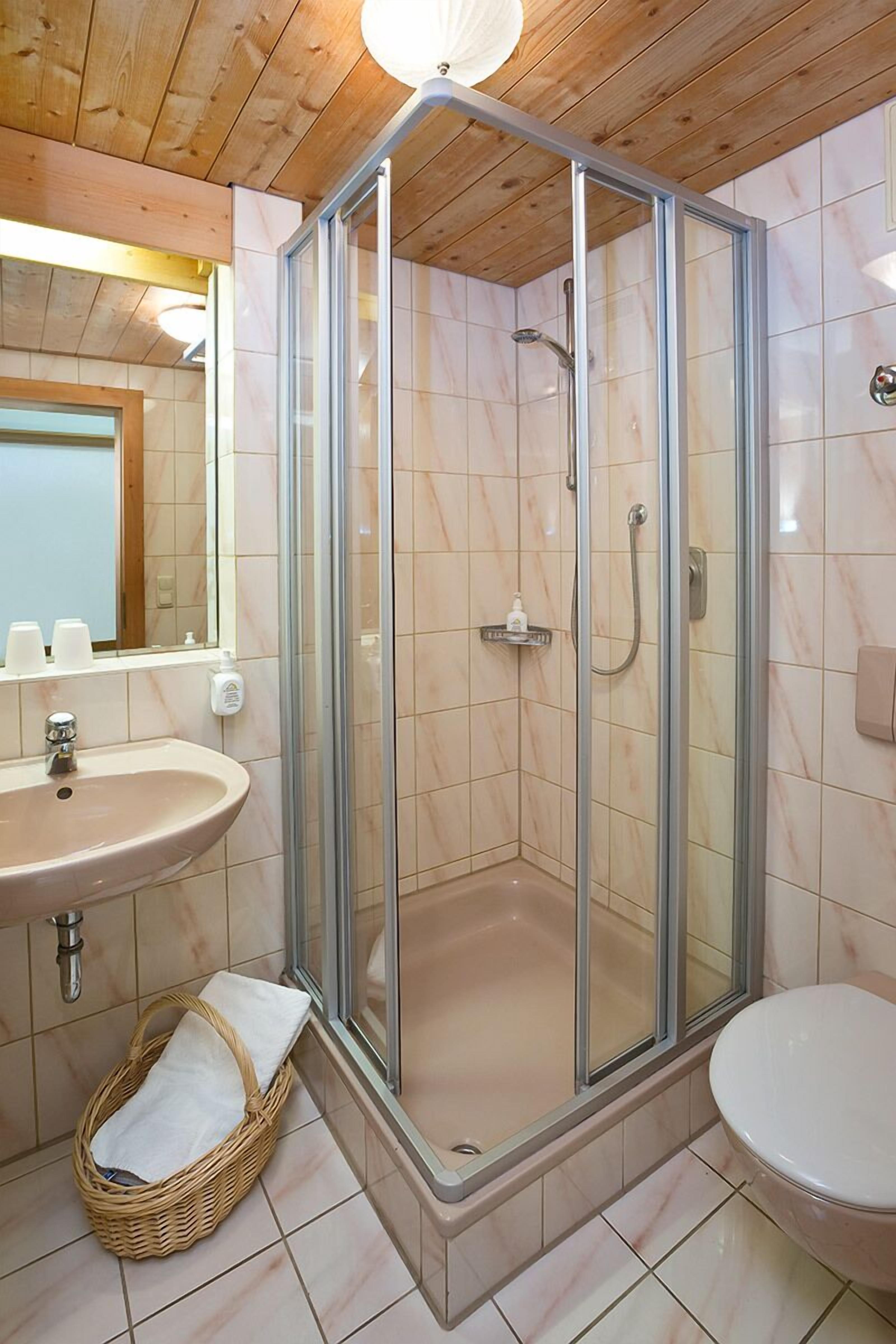 deep-soaking bathtub, free toiletries, hair dryer, dressing gowns