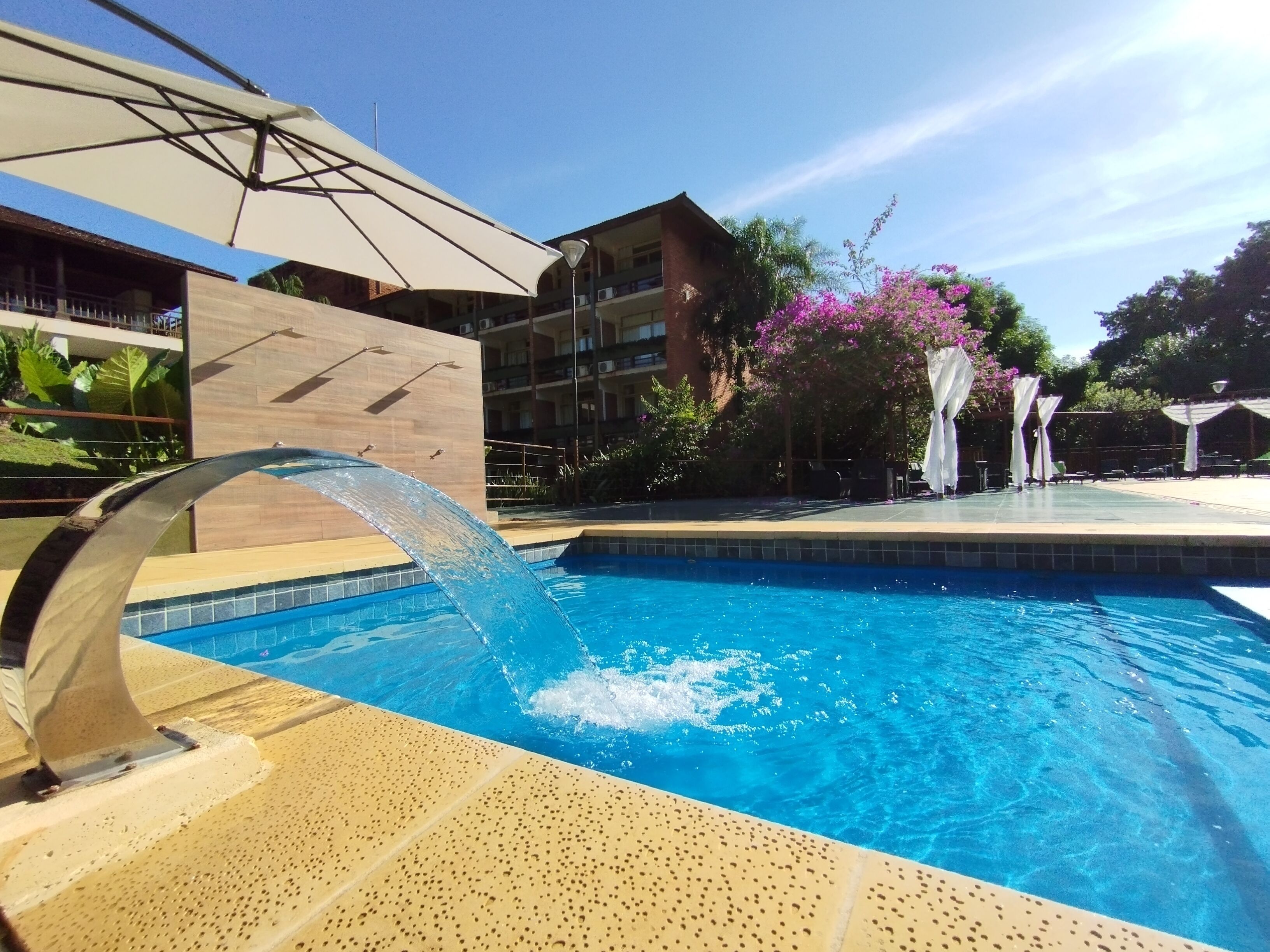 Outdoor pool, open 11:00 AM to 7:00 PM, sun loungers