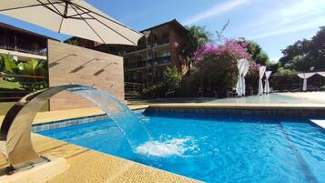 Outdoor pool, open 11:00 AM to 7:00 PM, sun loungers