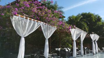 Outdoor pool, open 11:00 AM to 7:00 PM, sun loungers