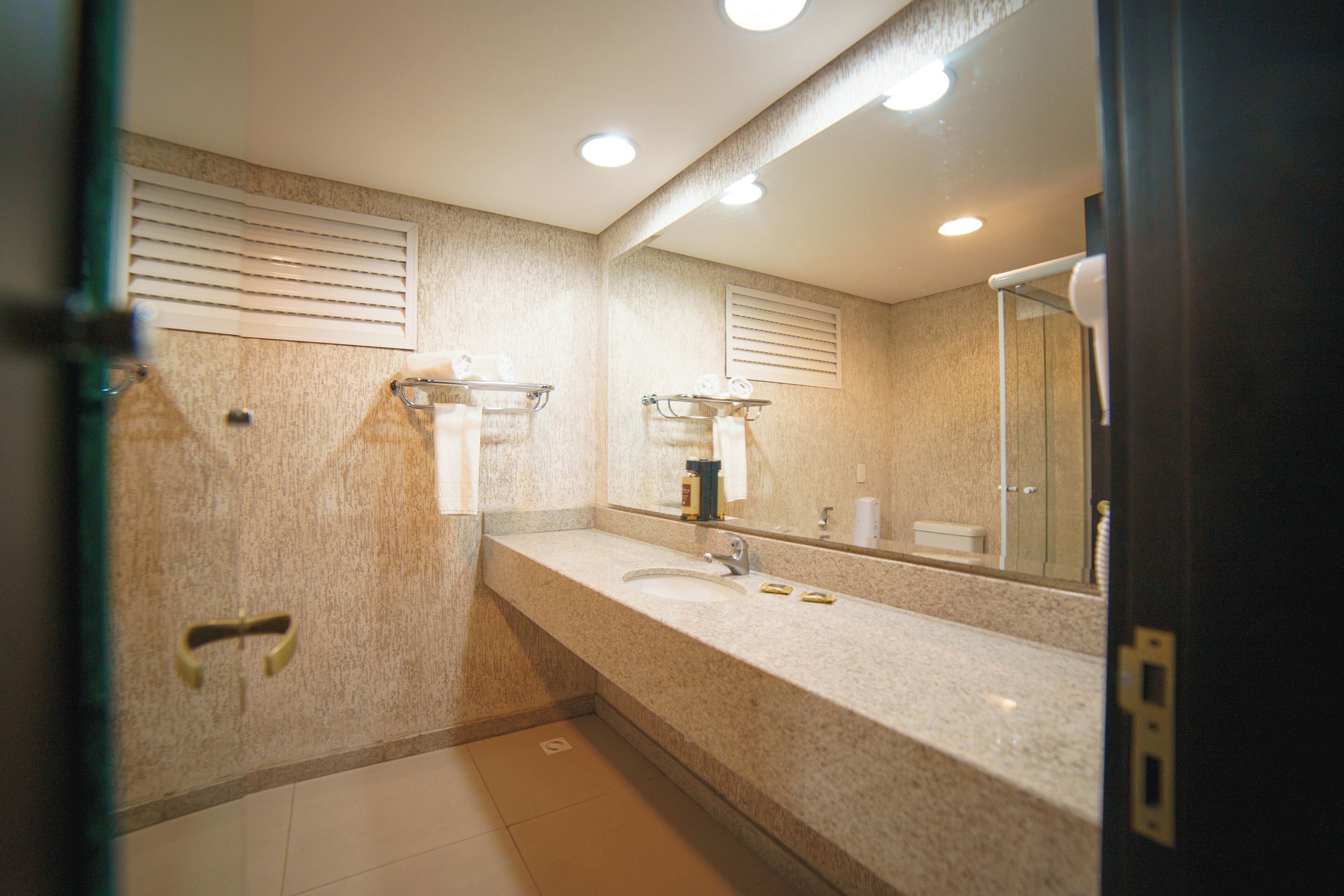 royal room | bathroom | shower, free toiletries, hair dryer, towels