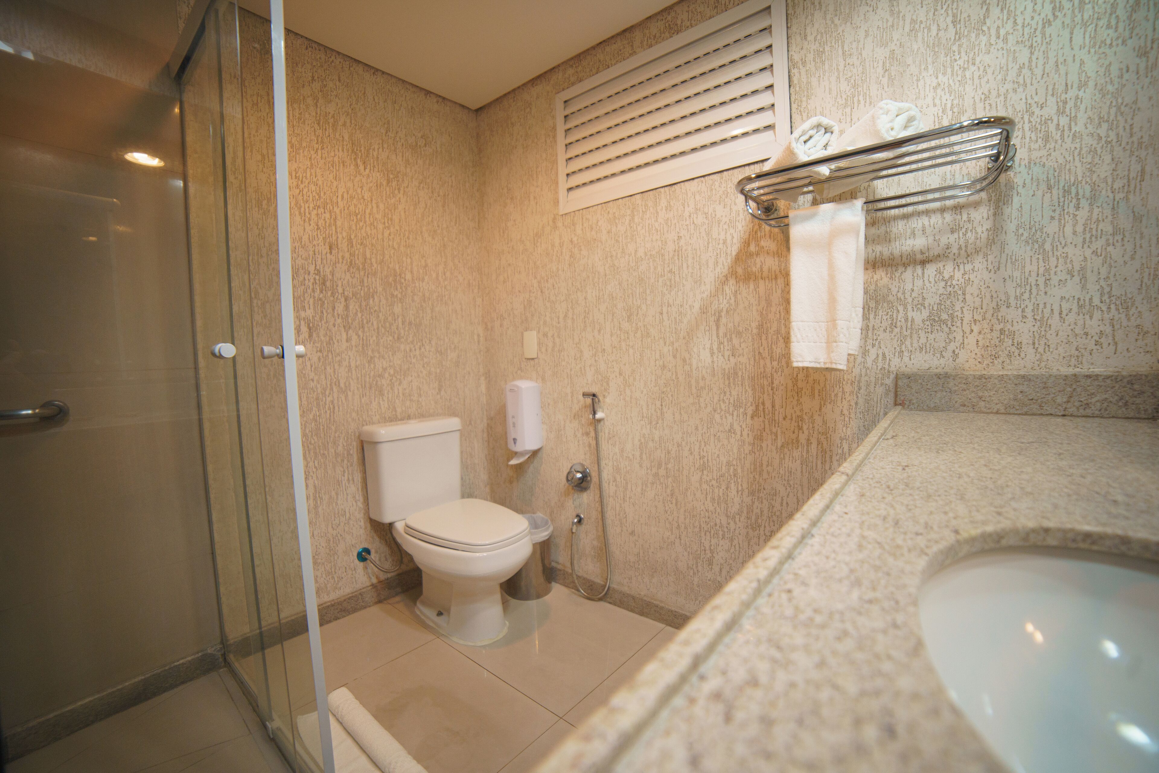 royal room | bathroom | shower, free toiletries, hair dryer, towels