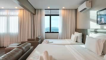 Family Triple Room | Premium bedding, pillow-top beds, minibar, in-room safe