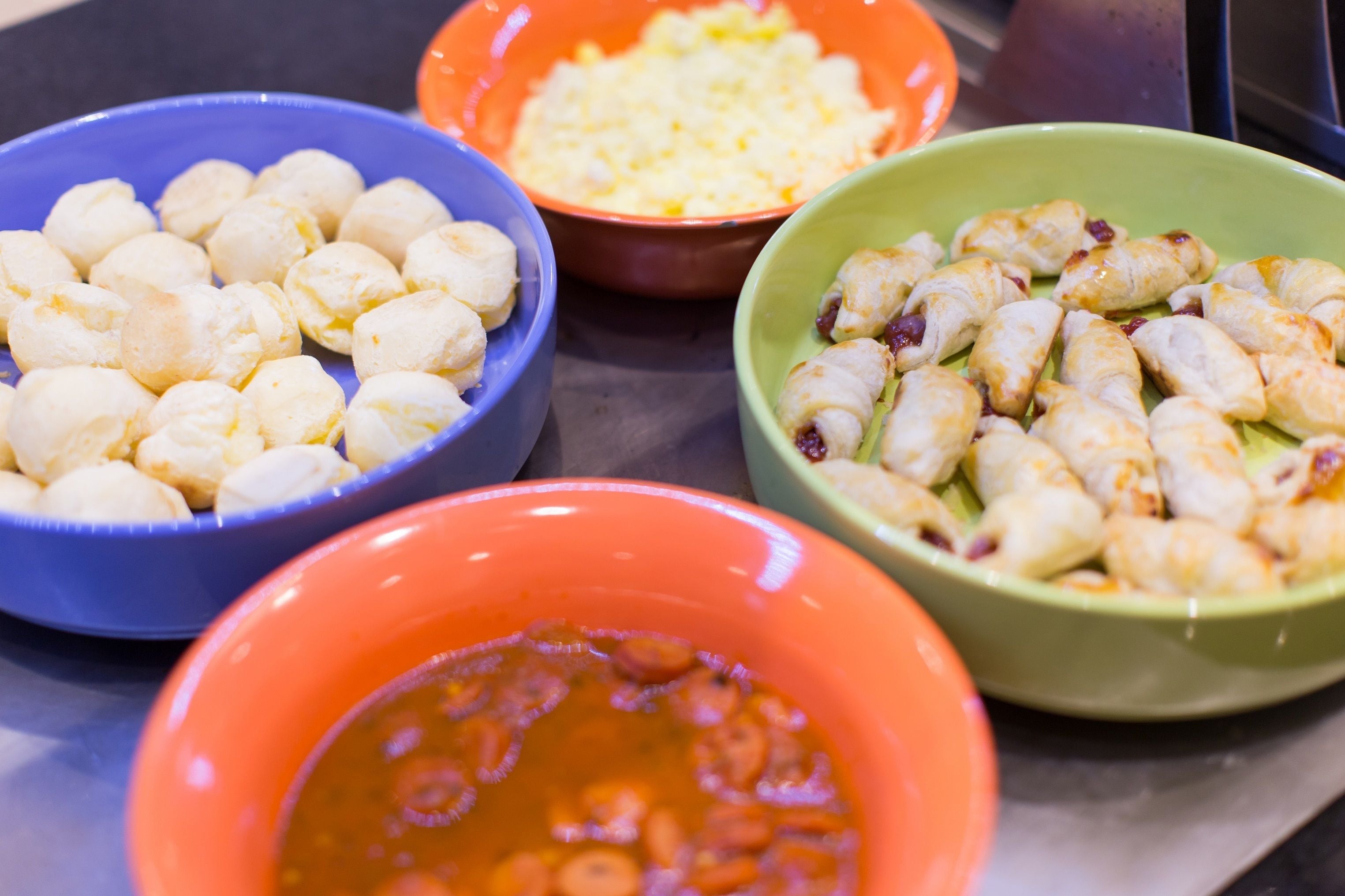 Three bowls of food with different fillings.
