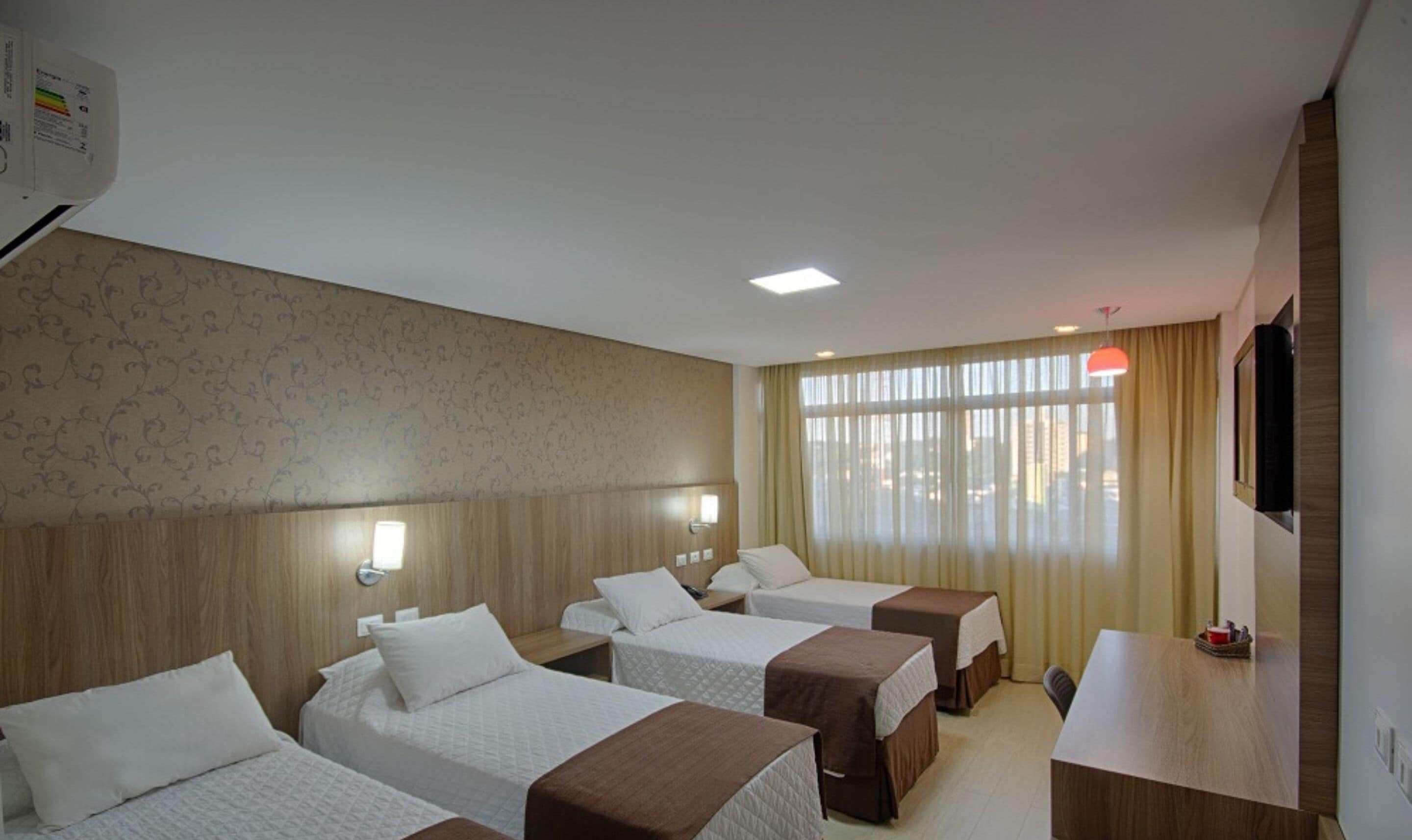 deluxe room | premium bedding, minibar, in-room safe, desk