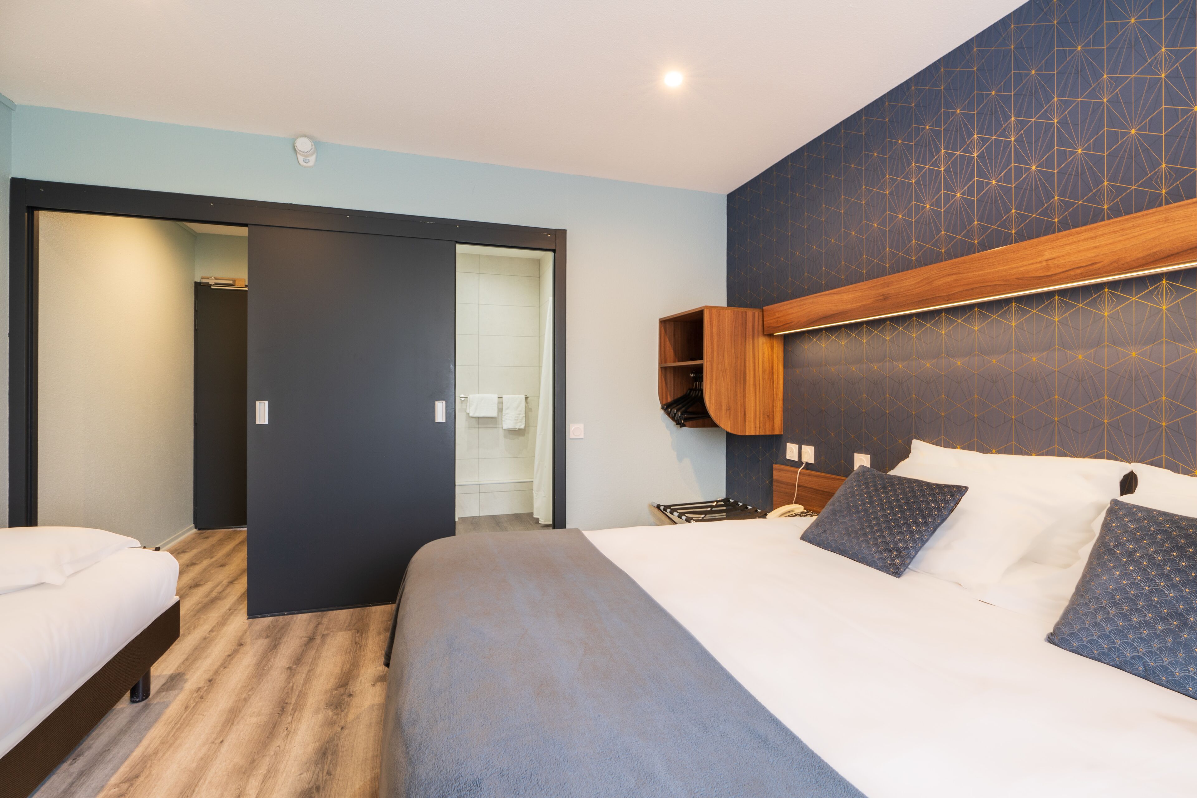 superior triple room, garden view | desk, blackout curtains, iron/ironing board, free wifi