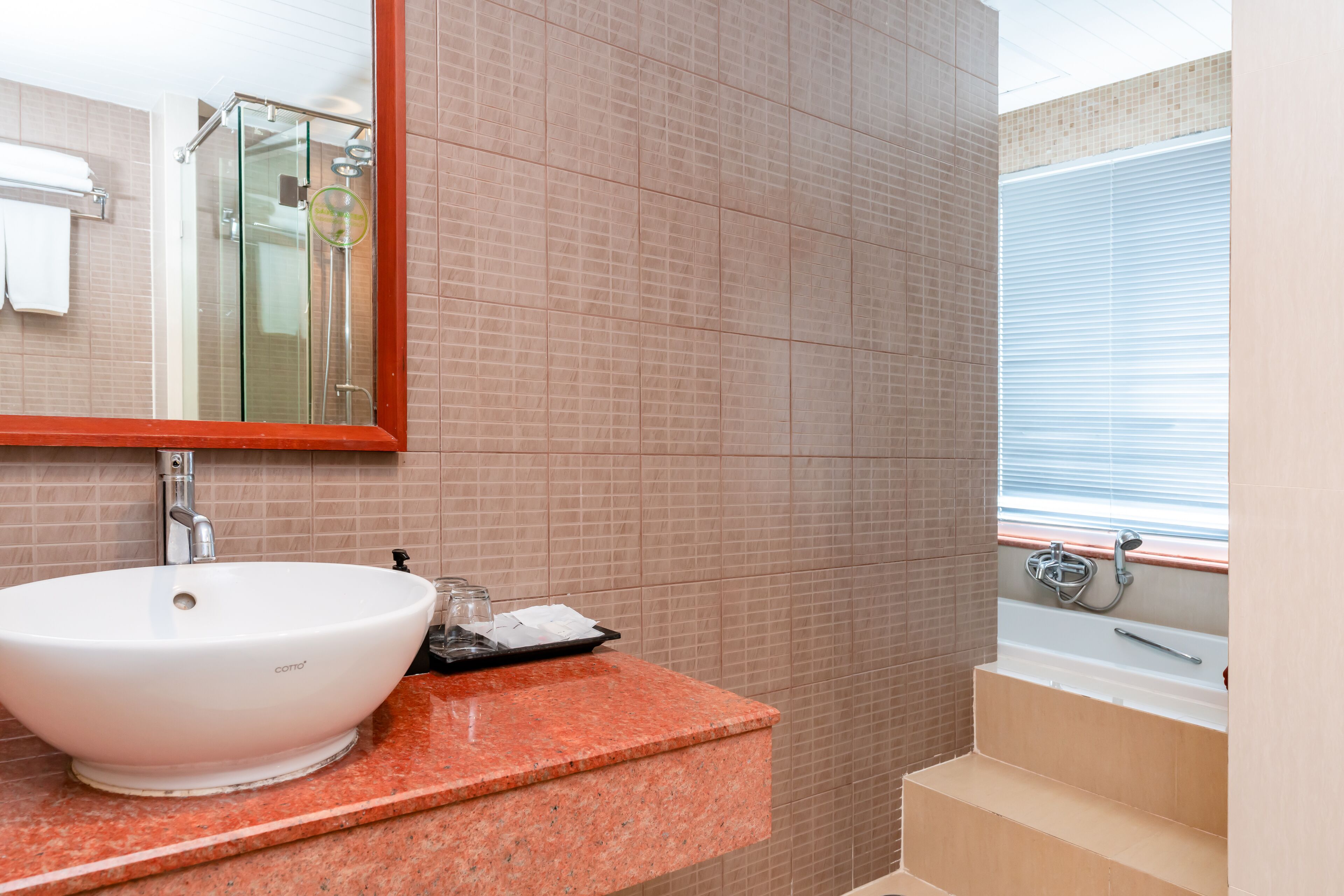 we suite, bathtub, corner | bathroom | shower, rainfall showerhead, free toiletries, hair dryer