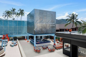 On the beach, white sand, beach towels, beach massages