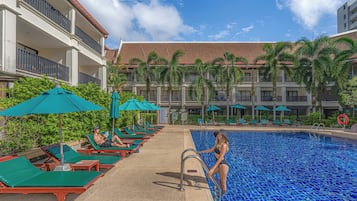 Outdoor pool, open 7:00 AM to 7:00 PM, pool umbrellas, pool loungers